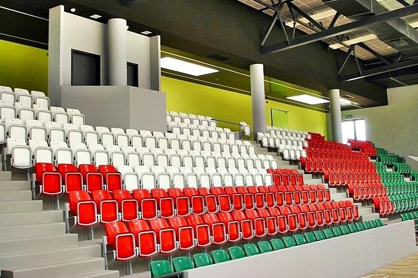 production of plastic seats for sports stands - folding seat - metal standing or hanging structure