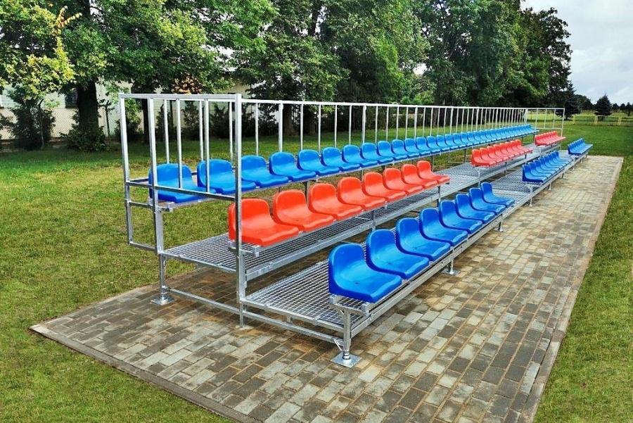 mobile three-row bleachers with plastic chairs with a comfortable medium back