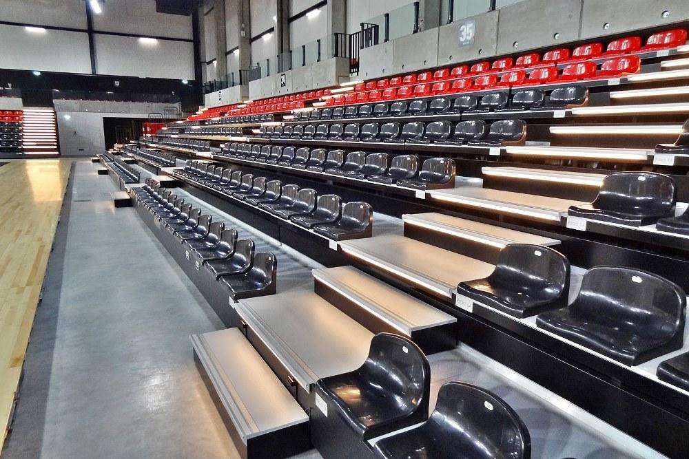 red and black medium back bleacher chairs for sports halls and stadiums