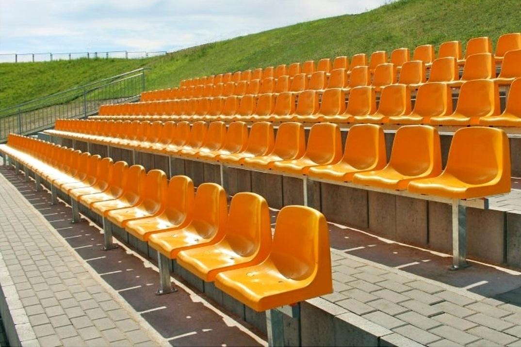 Stadium chairs on metal structure