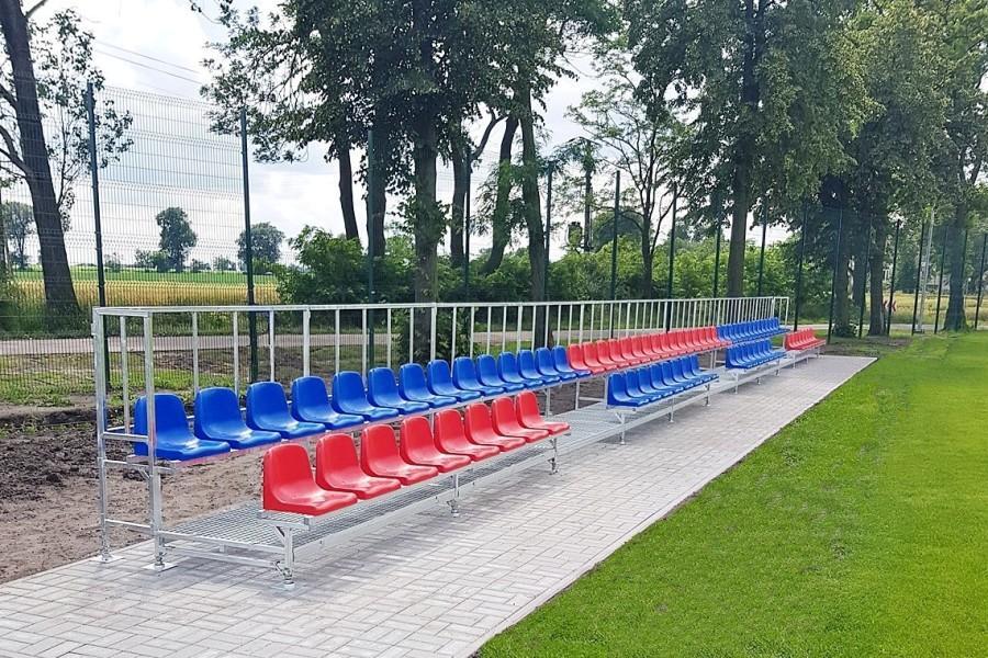 modern double-row metal stands with plastic chairs for shows and events
